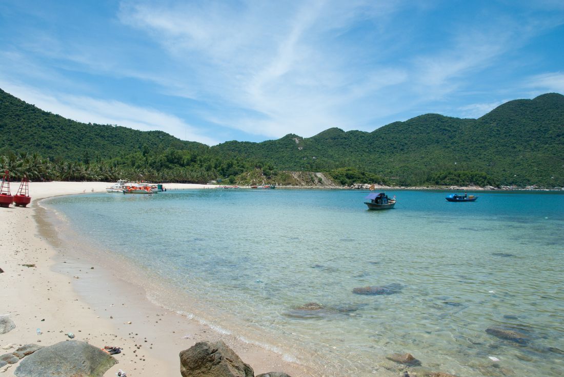 Sunny and warm tropical beach. Bay of Cham Islands